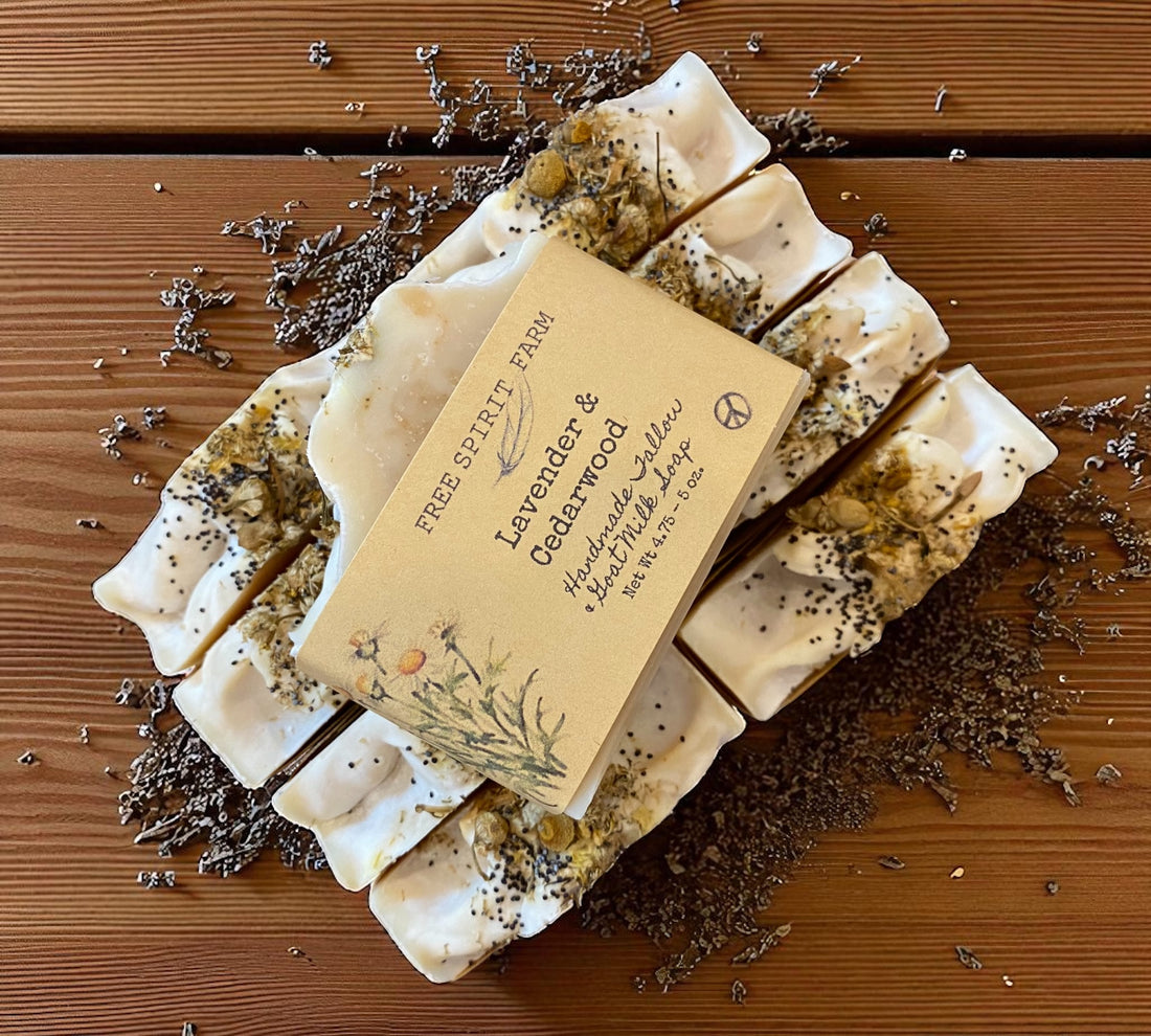 Bar of soap with a label on a wooden surface with lavender flowers