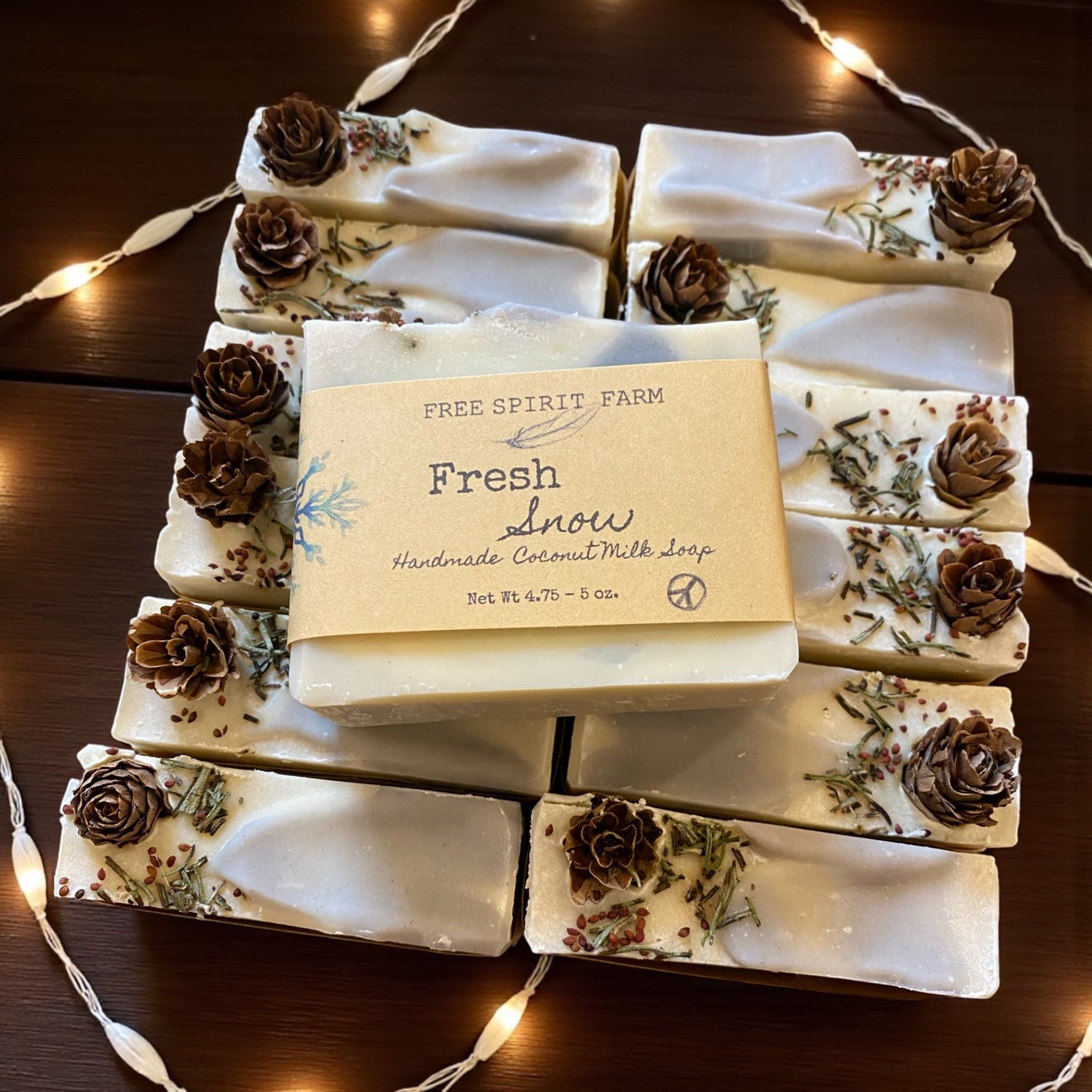 Handmade coconut milk soap with decorative packaging and &