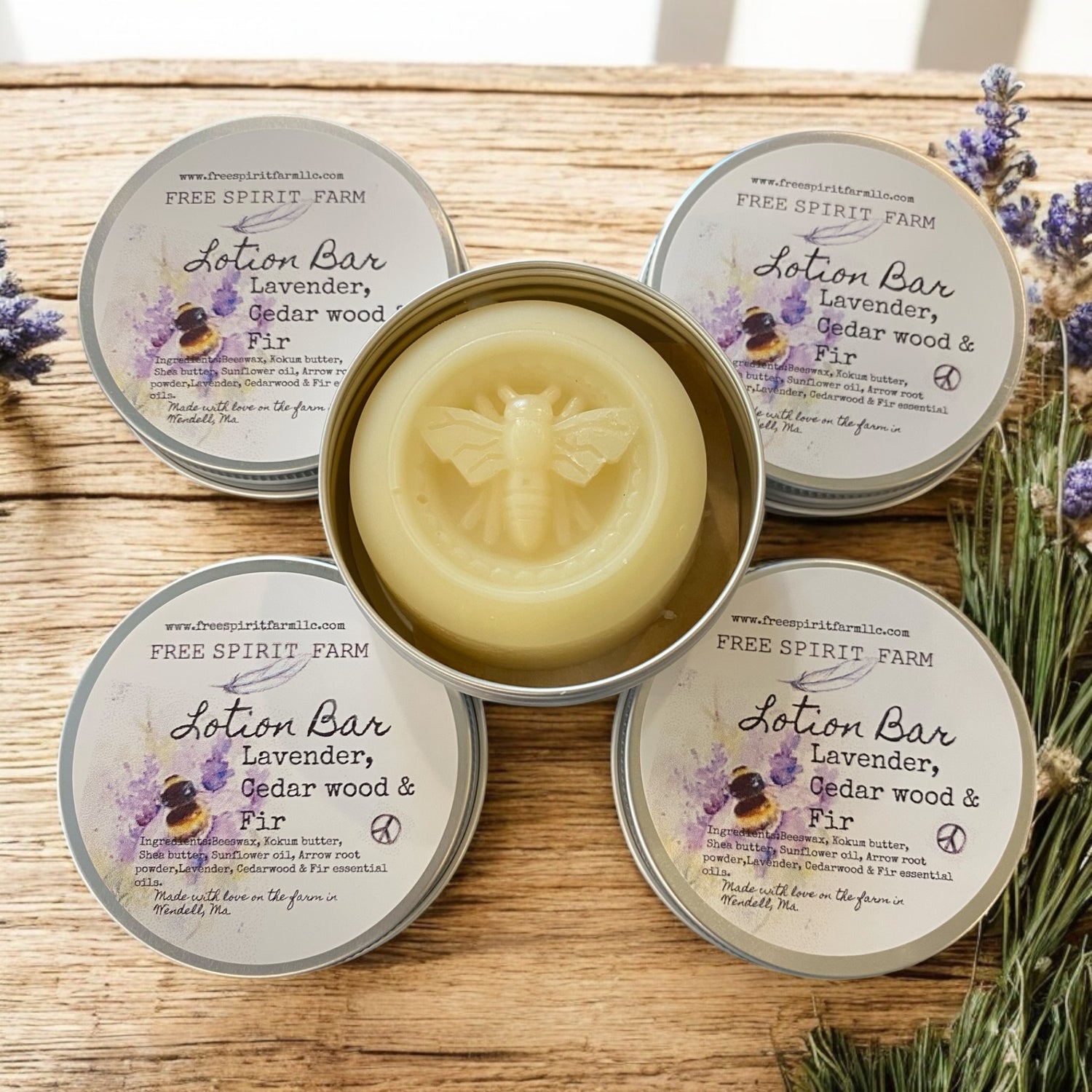 Lotion bar in a tin with &