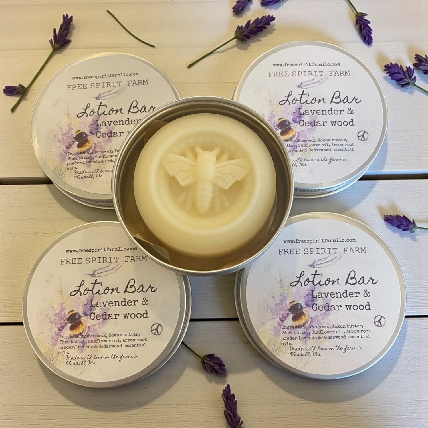 Lotion bar in a tin with &