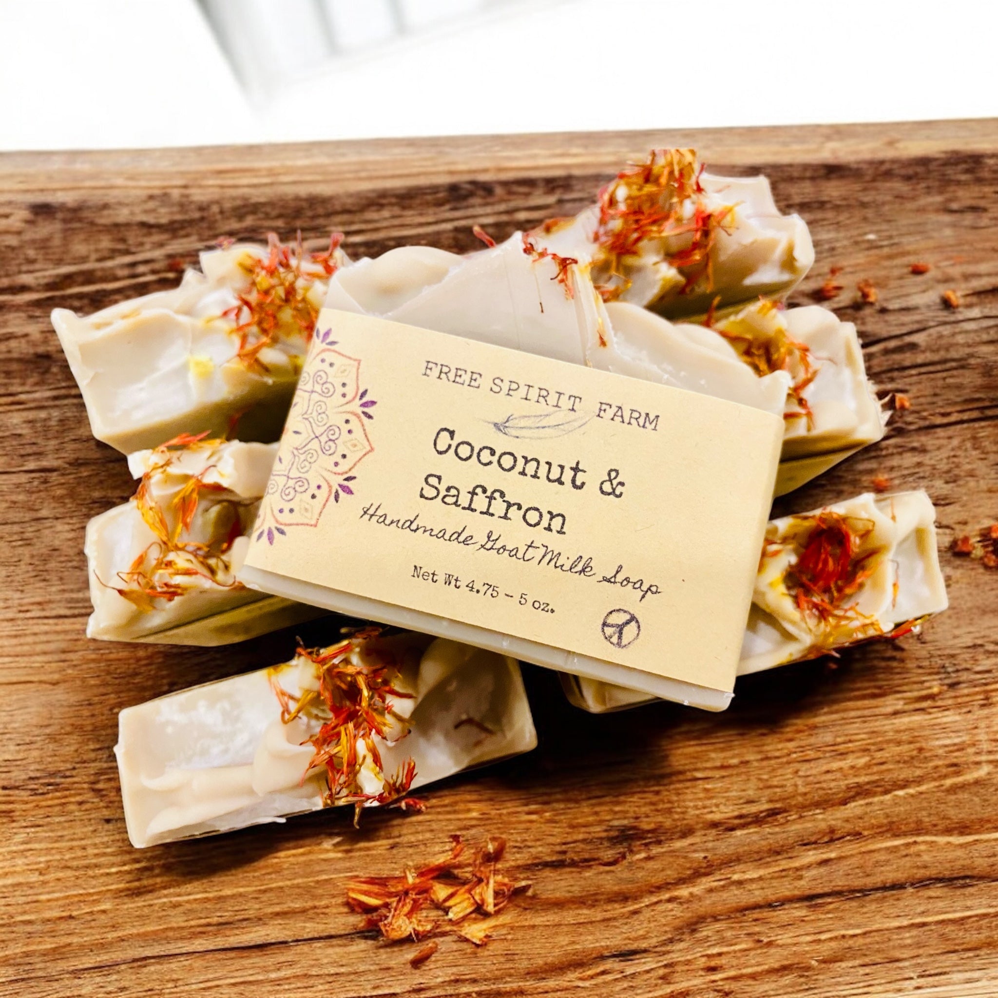 Handmade soap bars with a label on a wooden surface
