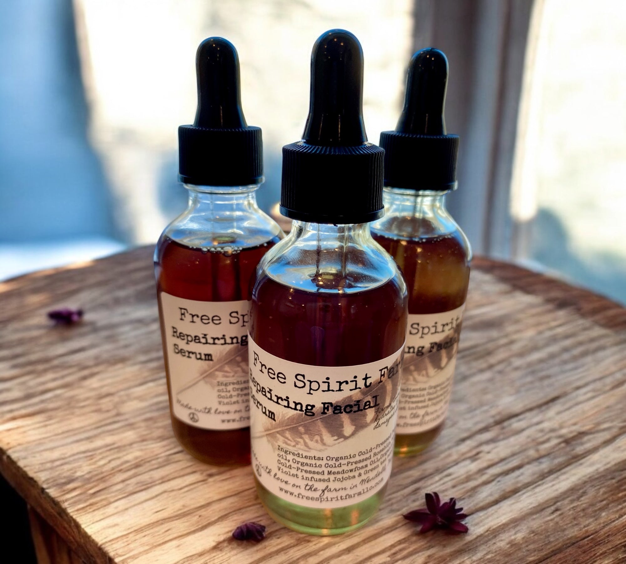 Three dropper bottles labeled &