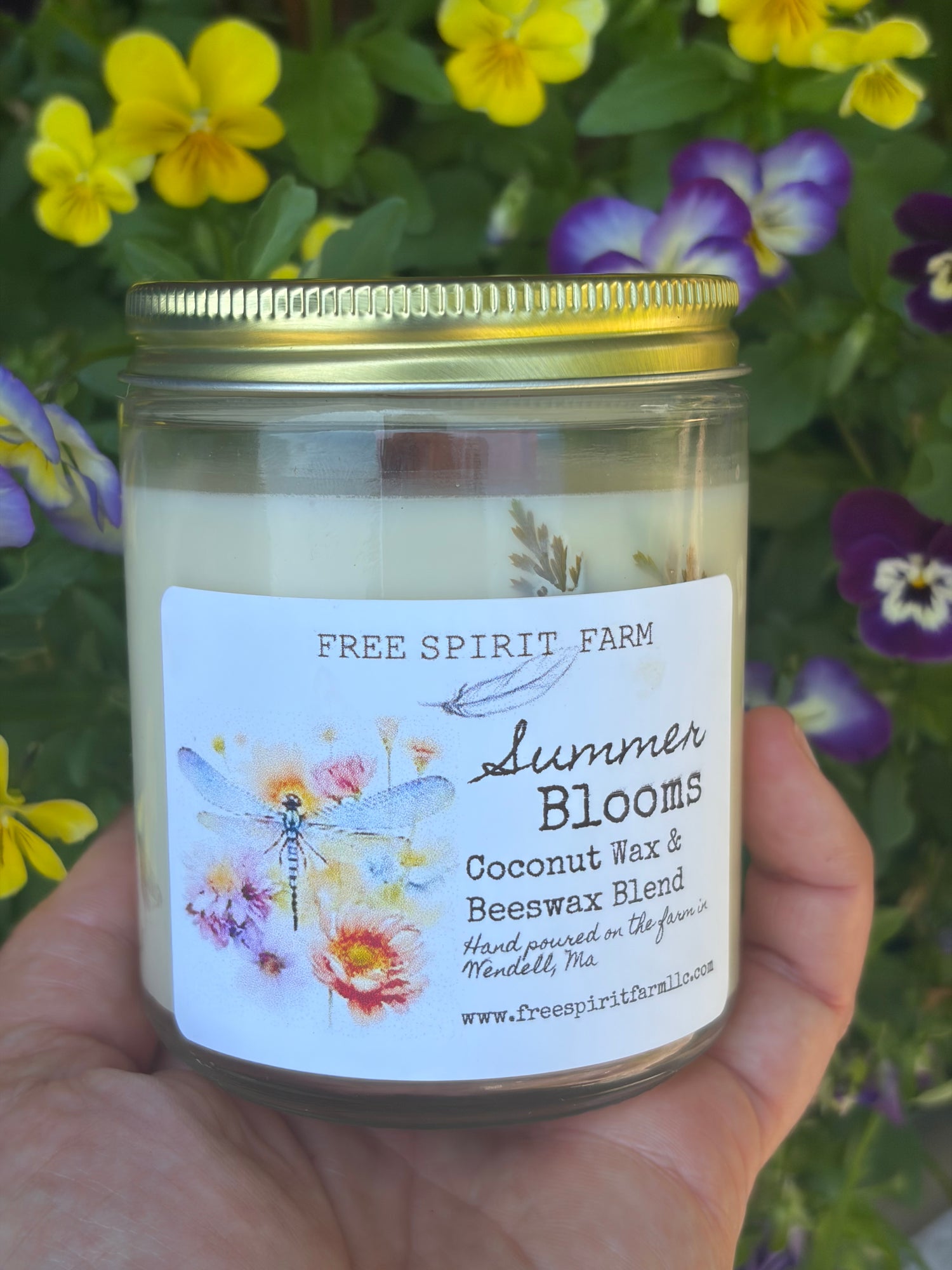 candle in blooms free spirit farm