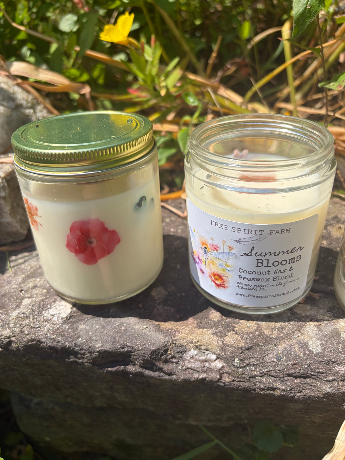 candles on a rock in summer free spirit farm