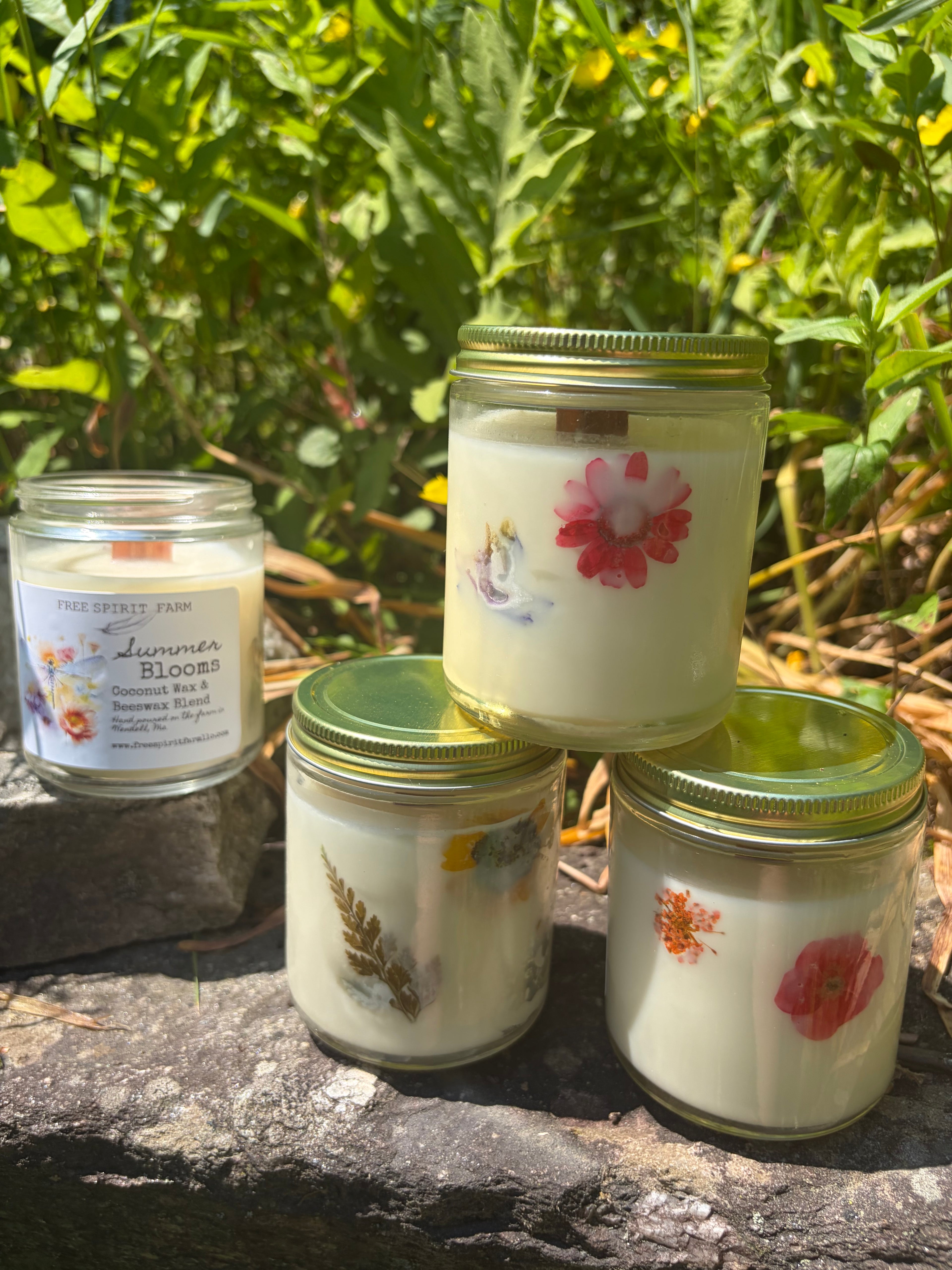 candles on rock in garden free spirit farm
