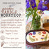 Advertisement for a garden candle workshop at Free Spirit Farm with a wooden dough bowl and flowers.